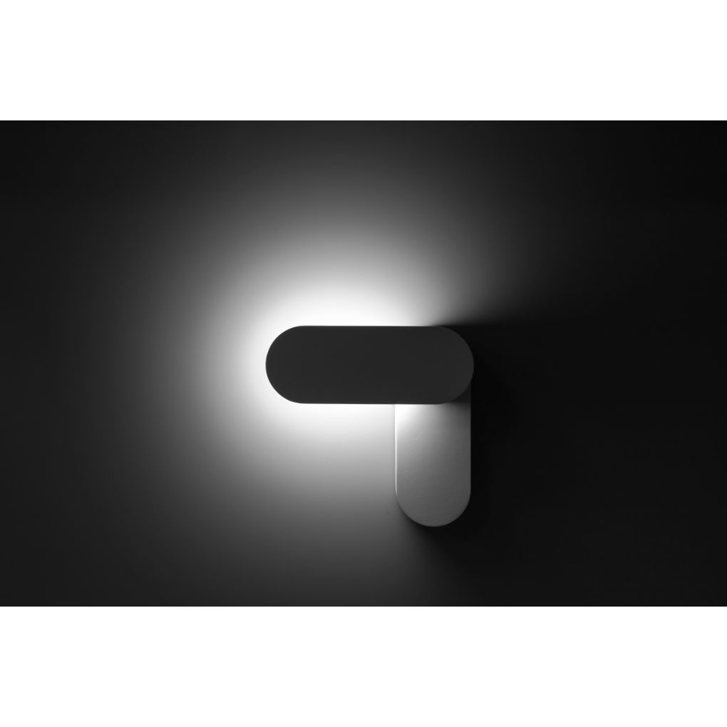 Luminario ovalado con luz indirecta rotativa para muro 9W luz cálida de iLumileds